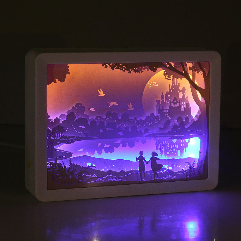 Light and shadow paper carving lamp