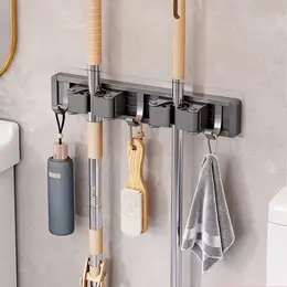Product image of Wall-Mounted Mop and Broom Holder with 3 Hooks and 2 Clips