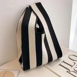 Hand-held knitted vest bag-striped model-beige black-1 piece